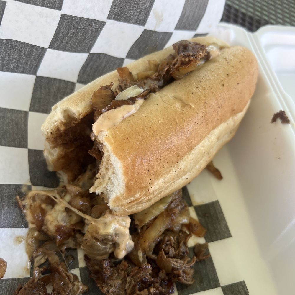 Steak with provolone and their bistro sauce (horseradish). Steak with provolone and their bistro sauce (horseradish).