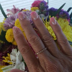 Nails by Ivis - Lady did a wondrous job on my grown out, two tone, pink ombre fill. She matched a color for me and added sparkle to blend in my old nails!