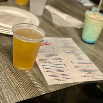 Valencia Restaurant - a plastic cup of beer on a table - Spanish Near Me - Winter Garden, Florida Valencia Restaurant - a plastic cup of beer on a table - Spanish Near Me - Winter Garden, Florida