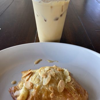 Duino Coffee - Fresh Almond Croissant with the vanilla cold brew coffee - Coffee & Tea Near Me - Mckinney, Texas Duino Coffee - Fresh Almond Croissant with the vanilla cold brew coffee - Coffee & Tea Near Me - Mckinney, Texas