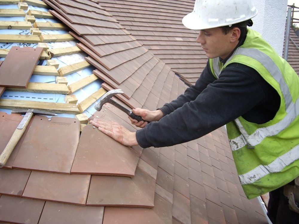 Slide of Precision Roofing