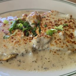Biscuit and gravy (half portion). Biscuit and gravy (half portion).