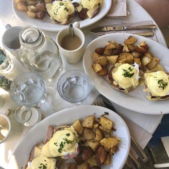 Oddfellows Cafe & Bar - a trio of eggs Benedict and coffees on the patio - Breakfast & Brunch Near Me - Seattle, Washington Oddfellows Cafe & Bar - a trio of eggs Benedict and coffees on the patio - Breakfast & Brunch Near Me - Seattle, Washington