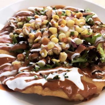 Tocabe An American Indian Eatery - Indian Taco, Grilled Chicken, Osage Hominy, Sweet Corn, Salad, Sour Cream and Ancho Chipotle Sauce Dressing - American Near Me - Denver, Colorado Tocabe An American Indian Eatery - Indian Taco, Grilled Chicken, Osage Hominy, Sweet Corn, Salad, Sour Cream and Ancho Chipotle Sauce Dressing - American Near Me - Denver, Colorado