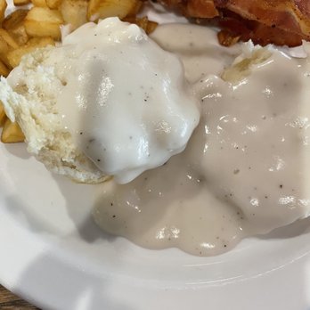 Shoney's Restaurant - Biscuit and gravy with bacon and pan fries - Breakfast & Brunch Near Me - Clarksville, Tennessee Shoney's Restaurant - Biscuit and gravy with bacon and pan fries - Breakfast & Brunch Near Me - Clarksville, Tennessee