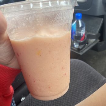 Pita Pit - a person holding a drink in a plastic cup - Fast Food Near Me - Birch Run, Michigan Pita Pit - a person holding a drink in a plastic cup - Fast Food Near Me - Birch Run, Michigan