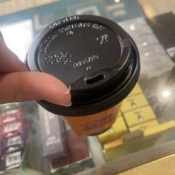 True Brew Espresso - While I was taking a sip of my coffee, I ended up with someone's nail in my mouth...