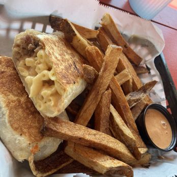Phat Daddy's on da Tracks - Mac&cheese/ pulled pork burrito. Sweet potato fries. Amazing sauce! - American Near Me - Charleston, West Virginia Phat Daddy's on da Tracks - Mac&cheese/ pulled pork burrito. Sweet potato fries. Amazing sauce! - American Near Me - Charleston, West Virginia