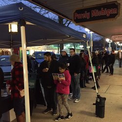 Purely Michigan - Line stretching outdoors for the annual chili fest.