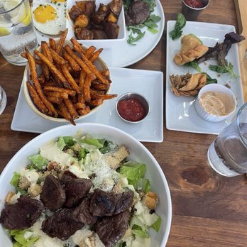 The Tasty Table - Steak Cesar salad, sweet potato fries, homemade empanadas, Steak and Eggs - American Near Me - Ossining, New York The Tasty Table - Steak Cesar salad, sweet potato fries, homemade empanadas, Steak and Eggs - American Near Me - Ossining, New York