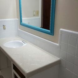 PWR resurfacing - Resurfaced bathroom. Sink, countertop surround and tub were resurfaced.