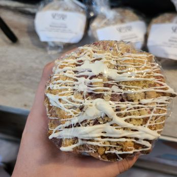 Buck N Brew Coffee - a hand holding a donut - Coffee & Tea Near Me - Campobello, South Carolina