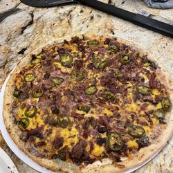 Brisket and jalapeño bbq pizza. Pre-made by Fresh. Crust could be better but brisket was clutch