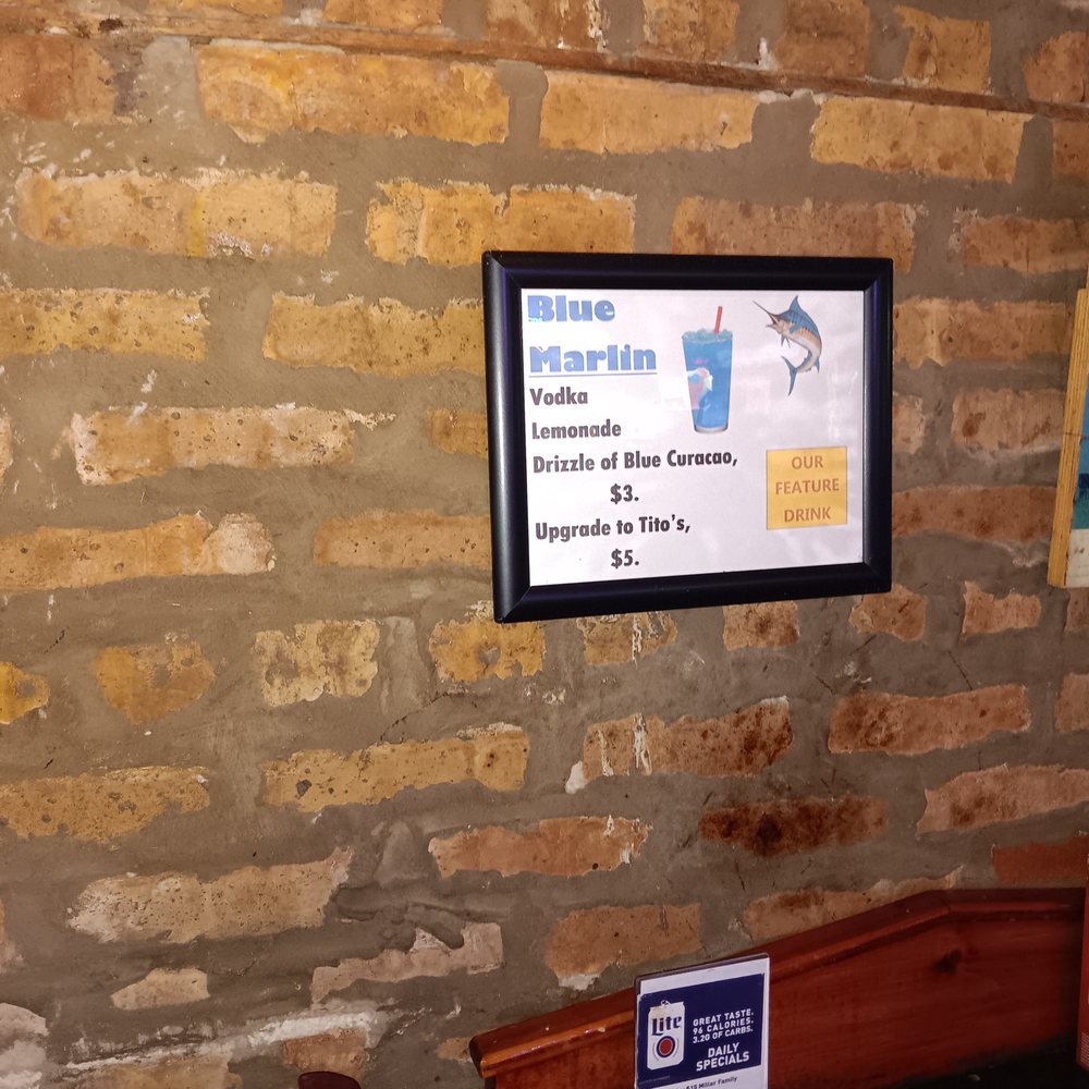 Marlins Bar & Grill - a brick wall with a clock - Bars Near Me - Lyons, Illinois Marlins Bar & Grill - a brick wall with a clock - Bars Near Me - Lyons, Illinois