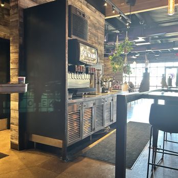 Hog & Tradition - Area for soft drinks, forks, knives and condiments including barbecue sauces. - Barbeque Near Me - Henderson, Nevada