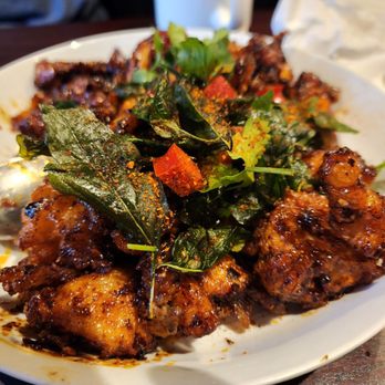 Buddha Ruksa - Crispy garlic chicken - Thai Near Me - Seattle, Washington Buddha Ruksa - Crispy garlic chicken - Thai Near Me - Seattle, Washington