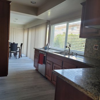Precise Flooring Design - a kitchen and dining room - Flooring Near Me - Huntington Beach, California