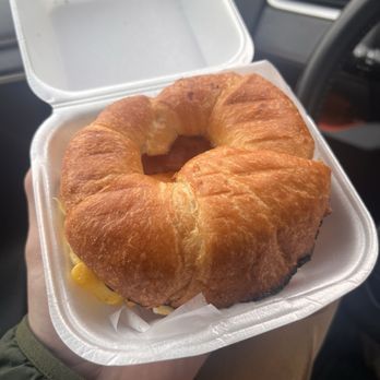 The Daily Grind - Bacon, Egg, & Cheese Croissant Breakfast Sandwich - Coffee & Tea Near Me - Meridian, Mississippi The Daily Grind - Bacon, Egg, & Cheese Croissant Breakfast Sandwich - Coffee & Tea Near Me - Meridian, Mississippi
