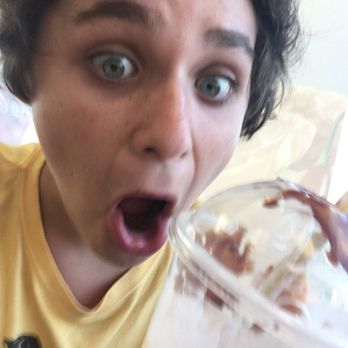 McDonald's - a man holding a cup of ice cream - Fast Food Near Me - Brockton, Massachusetts McDonald's - a man holding a cup of ice cream - Fast Food Near Me - Brockton, Massachusetts