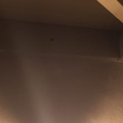 Impact Audio Visual - Holes drilled in outer patio wall. That job was never finished.