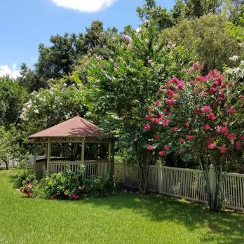 Watergrass Property Maintenance - a gazebo surrounded by trees - Landscaping Near Me Watergrass Property Maintenance - a gazebo surrounded by trees - Landscaping Near Me