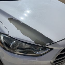 Barnes Crossing Hyundai - Peeling paint on hood