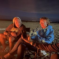 Tuckers Sand Dollar - Kneif & mom liking our campfire & our last night on our deserted beach front