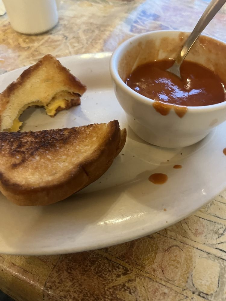 Corral Bar & Riverside Grill Logo