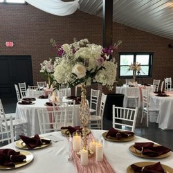 Boesen The Florist - Centerpieces that were white, lavender, fuchsia, and pale blush