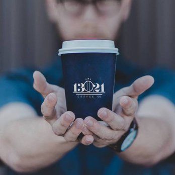 1321 Coffee Shop - a man holding a cup of coffee - Coffee & Tea Near Me - Cicero, Illinois 1321 Coffee Shop - a man holding a cup of coffee - Coffee & Tea Near Me - Cicero, Illinois