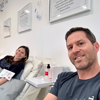 Hydration Room - Husband and I getting IV therapy! They gave us bag warmers because the IV Therapy can make you chilly - IV Hydration Near Me - Anaheim, California