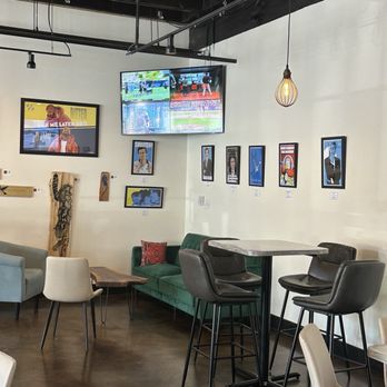 Percent - The Nook - Back room seating and tv on the wall - Beer, Wine & Spirits Near Me - Concord, North Carolina Percent - The Nook - Back room seating and tv on the wall - Beer, Wine & Spirits Near Me - Concord, North Carolina
