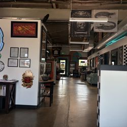 Space Monkey Tattoo - Hallway with other booths