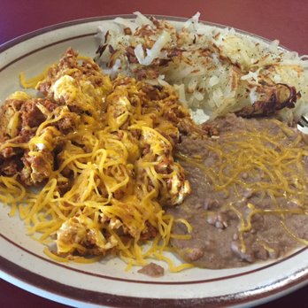 Lily's Cafe - Chorizo & Eggs - heavy on the cheese but not bad. - Latin American Near Me - Plano, Texas Lily's Cafe - Chorizo & Eggs - heavy on the cheese but not bad. - Latin American Near Me - Plano, Texas