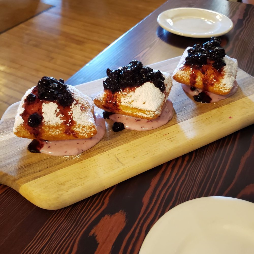 Belton Chalet - To die for huckleberry cheesecake beignets - Hotels Near Me - West Glacier, Montana