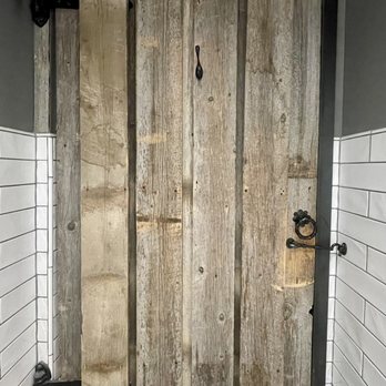 Roadhouse Boulder Depot - One of the stalls' door (ladies room) - New American Near Me - Boulder, Colorado
