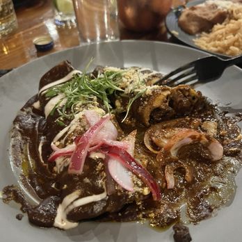 Flecha Cantina - Las Vegas - Close-up of the mole enchiladas - Mexican Near Me - Las Vegas, Nevada Flecha Cantina - Las Vegas - Close-up of the mole enchiladas - Mexican Near Me - Las Vegas, Nevada