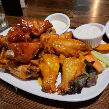 Poor Thom's Tavern - Wings. Half buffalo and half bbq bourbon - Salad Near Me - Plainfield, New Hampshire