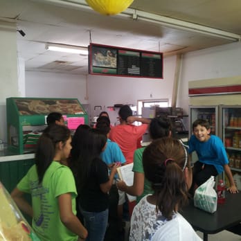 Pizza Pro - a large group of people in a restaurant - Pizza Near Me - Stanton, Texas Pizza Pro - a large group of people in a restaurant - Pizza Near Me - Stanton, Texas