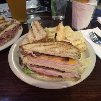 Dugan's Pub - Giant triple decker club and chips - Irish Near Me - Little Rock, Arkansas Dugan's Pub - Giant triple decker club and chips - Irish Near Me - Little Rock, Arkansas