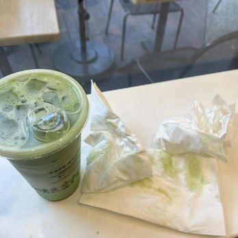 Cafe Dulce - blueberry matcha w oatmilk splattered everywhere ft 3 napkins to clean it - Coffee & Tea Near Me - Los Angeles, California Cafe Dulce - blueberry matcha w oatmilk splattered everywhere ft 3 napkins to clean it - Coffee & Tea Near Me - Los Angeles, California