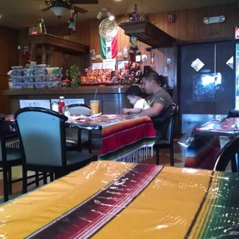 El Potrillo Mexican Restaurant - a woman sitting at a table in a mexican restaurant - Mexican Near Me - Trenton, New Jersey El Potrillo Mexican Restaurant - a woman sitting at a table in a mexican restaurant - Mexican Near Me - Trenton, New Jersey