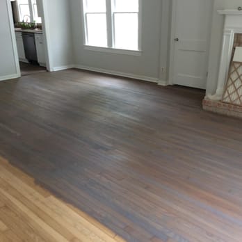 Designer Wood Flooring - Applying a mixture stain with a touch of grey in it. - Flooring Near Me - Spring Branch, Texas Designer Wood Flooring - Applying a mixture stain with a touch of grey in it. - Flooring Near Me - Spring Branch, Texas