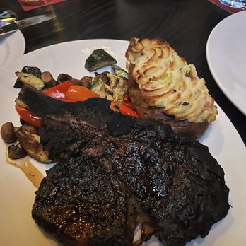 The Keg Steakhouse + Bar - Steak & double baked potato - Steakhouses Near Me - Calgary, Alberta