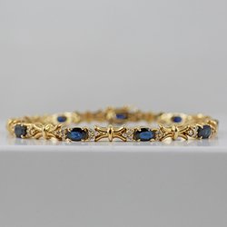Golden Impulse - 14k yellow gold sapphire and diamond bracelet.