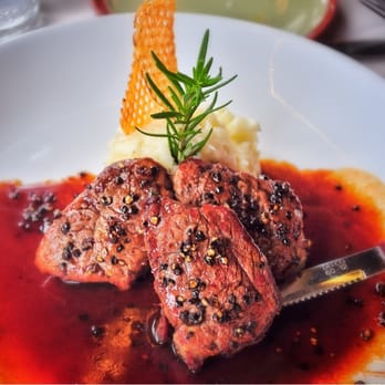 Hukilau Lanai - Wally's steak Crown Royal (pan-seared peppercorn crusted tenderloin medallions, Crown Royal demi-glace, potato of the day) - Seafood Near Me - Kapaa, Hawaii