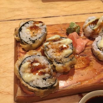 Asian City - Spicy tuna inside, the roll is dipped in tempura-like batter and then fried, sliced, and drizzled with sauce. Love the sky roll! - Asian Fusion Near Me - Nacogdoches, Texas Asian City - Spicy tuna inside, the roll is dipped in tempura-like batter and then fried, sliced, and drizzled with sauce. Love the sky roll! - Asian Fusion Near Me - Nacogdoches, Texas
