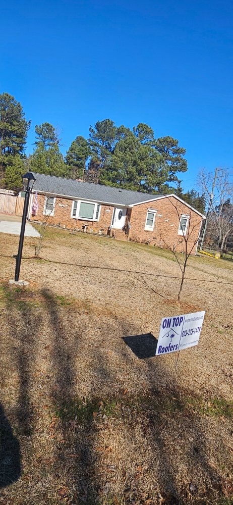 Slide of On Top Roofers