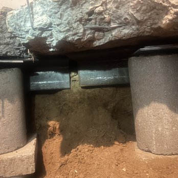 Level Pro Foundation Repair - View of pier heads under foundation - General Contractors Near Me Level Pro Foundation Repair - View of pier heads under foundation - General Contractors Near Me