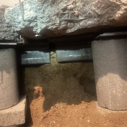 Level Pro Foundation Repair - View of pier heads under foundation